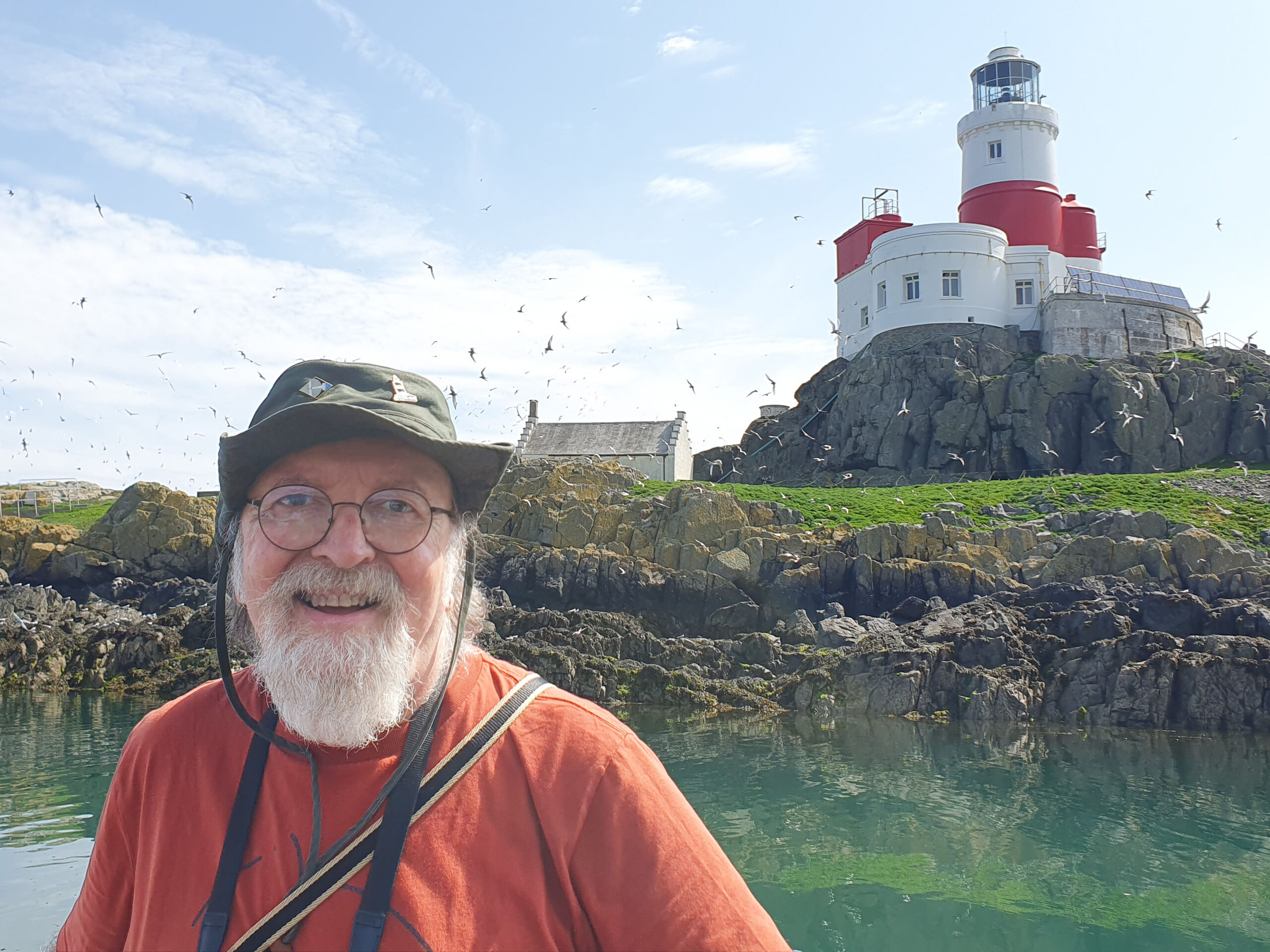 Warren Kovach, author of Lighthouses of Wales, near the Skerries lighthouse